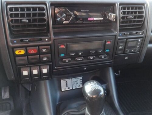 Center Dash Switch Panel - Discovery and Range Rover Classic — Panel Only, Switches are not included Perfect for lights, diff-locks, winch switches, etc. Can be mounted on either the left or right side. Compatible with Discovery and Range Rover Classic.