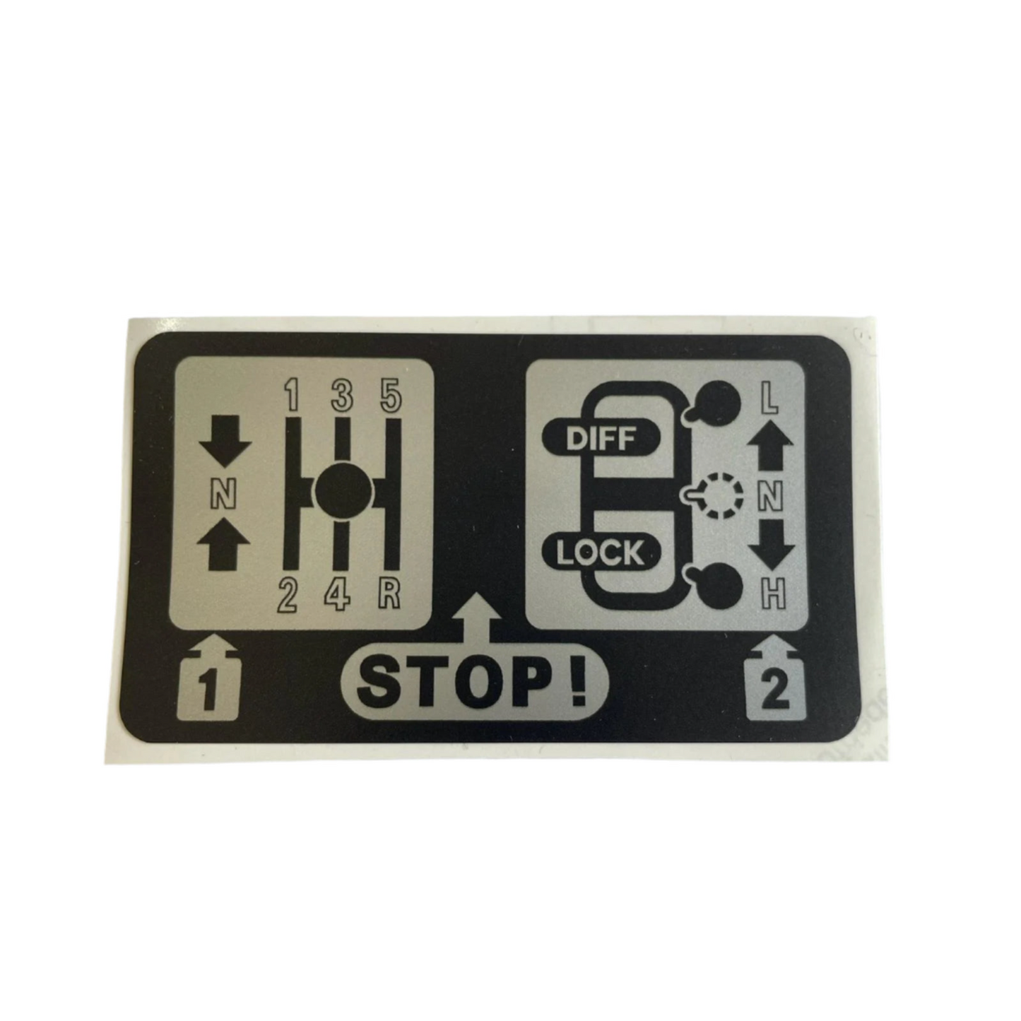 AWR1183 / BTR9547 – Transmission Warning Label (Cubby Box) — Manual — Land Rover warning sticker fitted inside the cubby box on manual transmission models of the Range Rover Classic and Discovery 1. Reminds drivers of transmission safety instructions. Ideal for restoration or replacement.