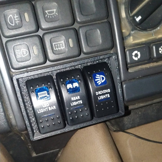 Center Dash Switch Panel - Discovery and Range Rover Classic — Panel Only, Switches are not included Perfect for lights, diff-locks, winch switches, etc. Can be mounted on either the left or right side. Compatible with Discovery and Range Rover Classic.
