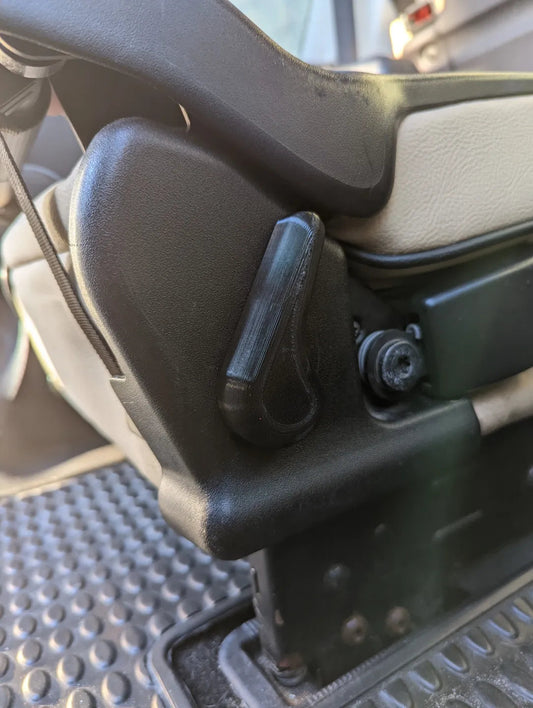 Land Rover Discovery II SE7 Jump Seat Handles — Replacement handles for folding the jump seats in an LR Disco II SE7 Comes with left and right side handles. Replaces HXO100020 and HXO100030 Please note that the handles are tight fitted and don't use a bearing like OEM.