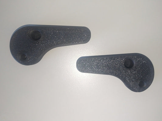 Land Rover Discovery II SE7 Jump Seat Handles — Replacement handles for folding the jump seats in an LR Disco II SE7 Comes with left and right side handles. Replaces HXO100020 and HXO100030 Please note that the handles are tight fitted and don't use a bearing like OEM.