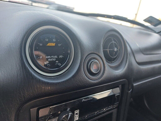 MX5 AEM Wideband Gauge Vent Mount — Fits AEM Wideband O2 controller into the "eye ball" air vent inlets in 2002 Mazda MX-5 NBFL. It is compatible with all MX-5s from 1990 to 2004, as far as I know these models had the same vent holes.