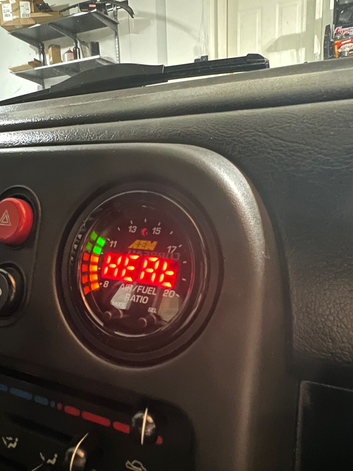 MX5 AEM Wideband Gauge Vent Mount — Fits AEM Wideband O2 controller into the "eye ball" air vent inlets in 2002 Mazda MX-5 NBFL. It is compatible with all MX-5s from 1990 to 2004, as far as I know these models had the same vent holes.
