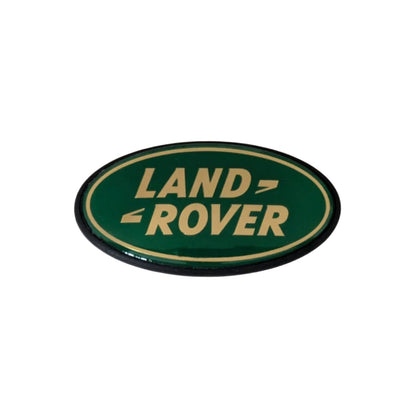 Range Rover Classic Grille Badge Plinth & BADGE — Rear Tailgate / Gold & Green — Enhance your Range Rover Classic's authentic style with this high-quality badge plinth and badge set. Whether you're restoring a classic or adding a personal touch, this is the perfect finishing detail.