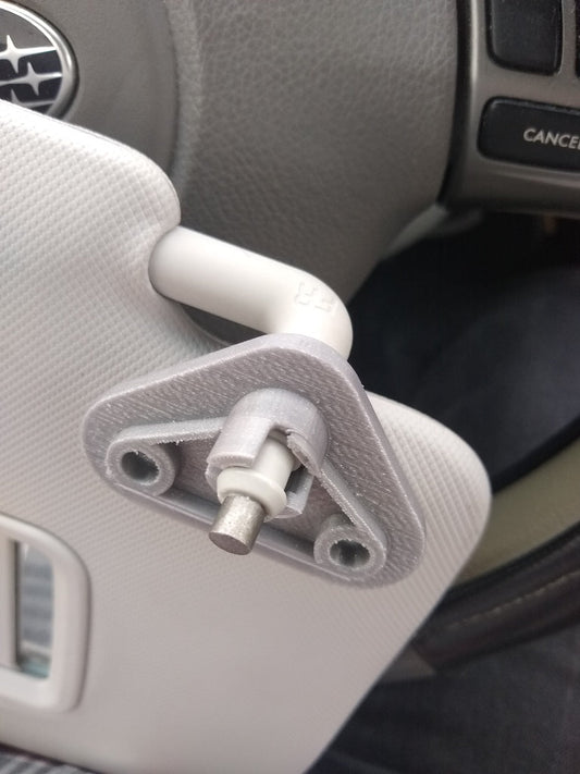 Subaru Forester | Crosstrek | Impreza Sun Visor Mount — This is the mount that holds up the sun visor. Fits: 2008-2018 Subaru Forester 2010 Subaru Impreza 2013-2019 Subaru Crosstrek