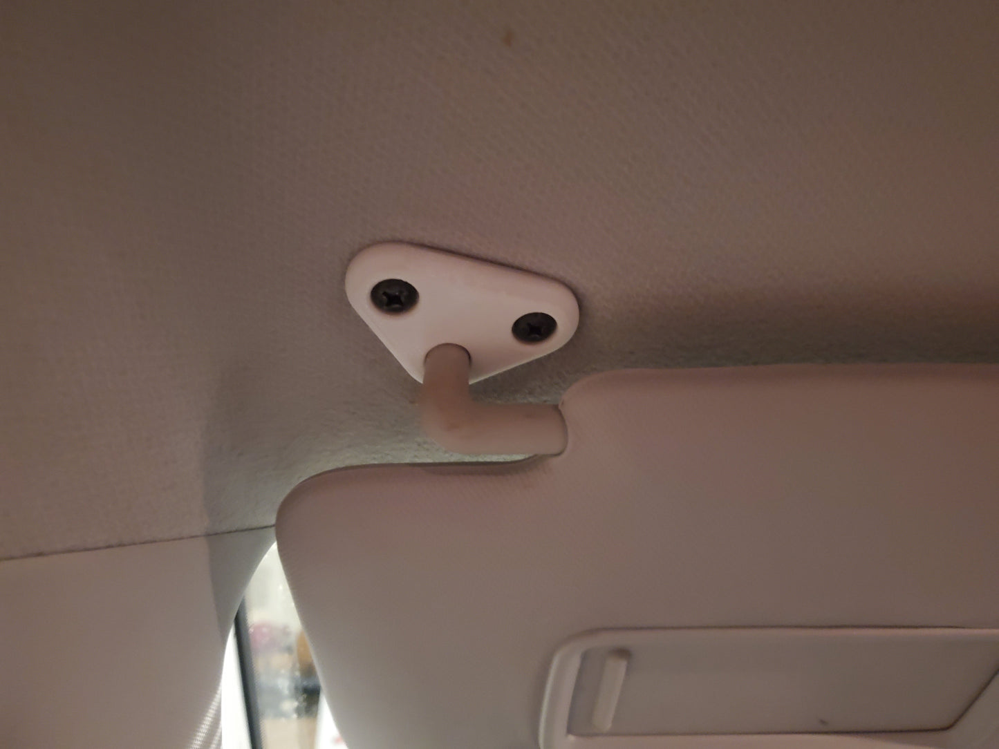 Subaru Forester | Crosstrek | Impreza Sun Visor Mount — This is the mount that holds up the sun visor. Fits: 2008-2018 Subaru Forester 2010 Subaru Impreza 2013-2019 Subaru Crosstrek