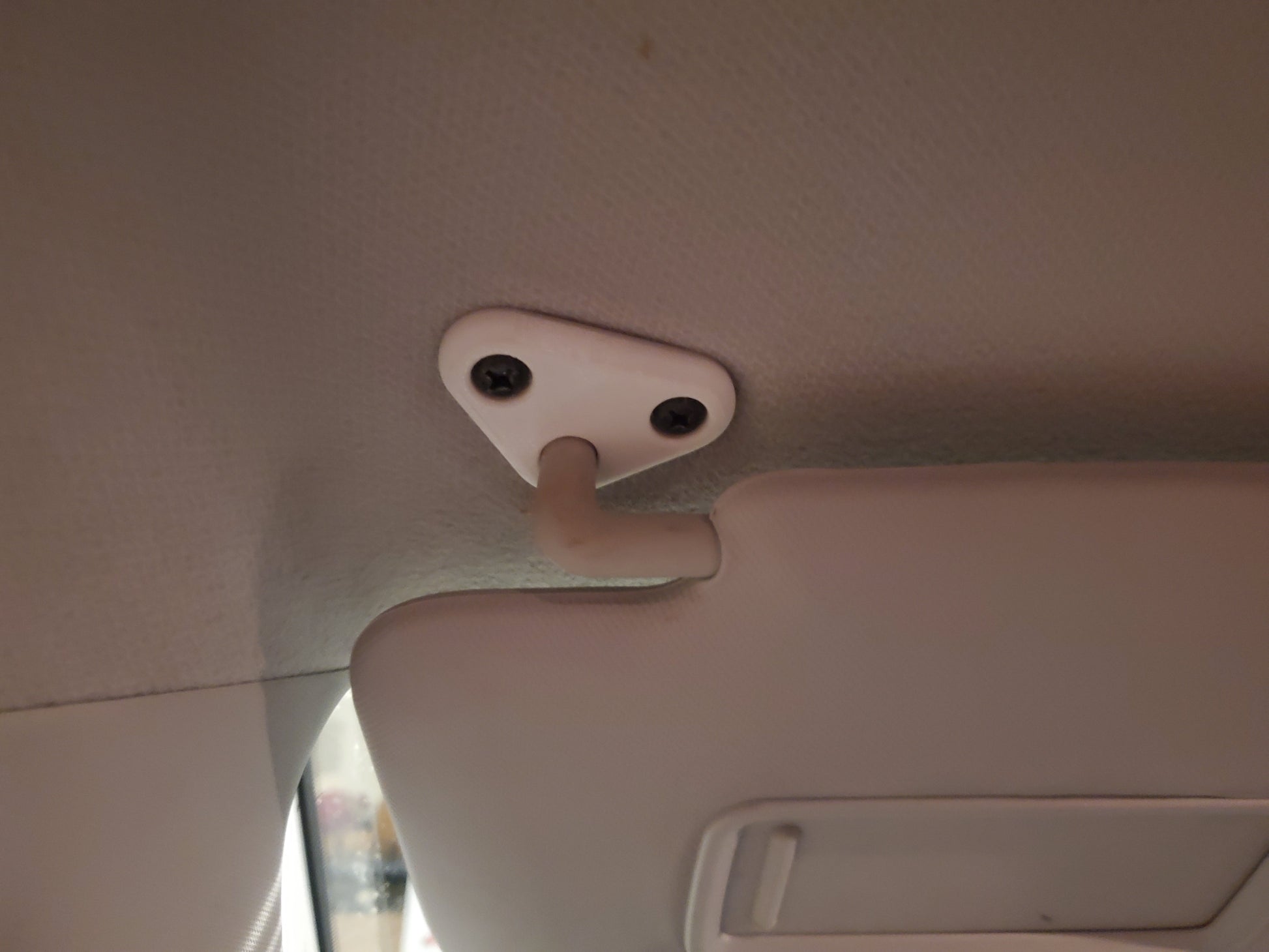 Subaru Forester | Crosstrek | Impreza Sun Visor Mount — This is the mount that holds up the sun visor. Fits: 2008-2018 Subaru Forester 2010 Subaru Impreza 2013-2019 Subaru Crosstrek