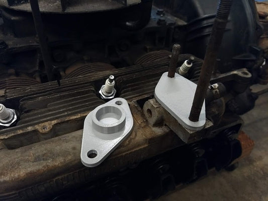 Corvair Intake Manifold Covers — Intake manifold covers for a 110 Hp corvair engine. While a paper towel "burrito" works fine to keep foreign materials out of the intake when the carbs are removed, these also protect the sealing surface from damage - ideal for then presser washing or soda/bead bead blasting the heads. 2 covers included.