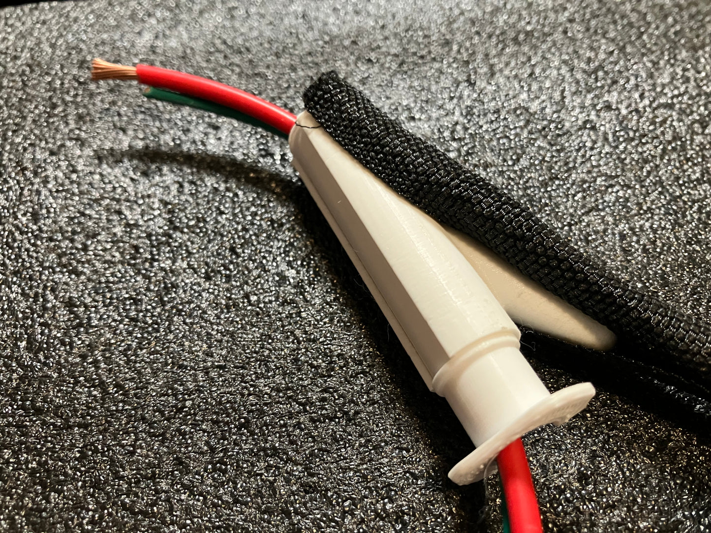 Automotive Wire Loom Tool — Feed wires into the loom without fighting the wrap. This automotive wire loom tool assists with wire wrapping and wiring harness work. Made to assist in getting wires into the “loom” or wire wrapping. Two tools are provided: a small and a large. Small and large sizes included Helps guide wires into loom or wire wrapping Two-piece tool set