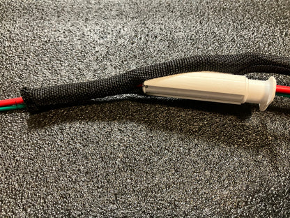 Automotive Wire Loom Tool — Feed wires into the loom without fighting the wrap. This automotive wire loom tool assists with wire wrapping and wiring harness work. Made to assist in getting wires into the “loom” or wire wrapping. Two tools are provided: a small and a large. Small and large sizes included Helps guide wires into loom or wire wrapping Two-piece tool set