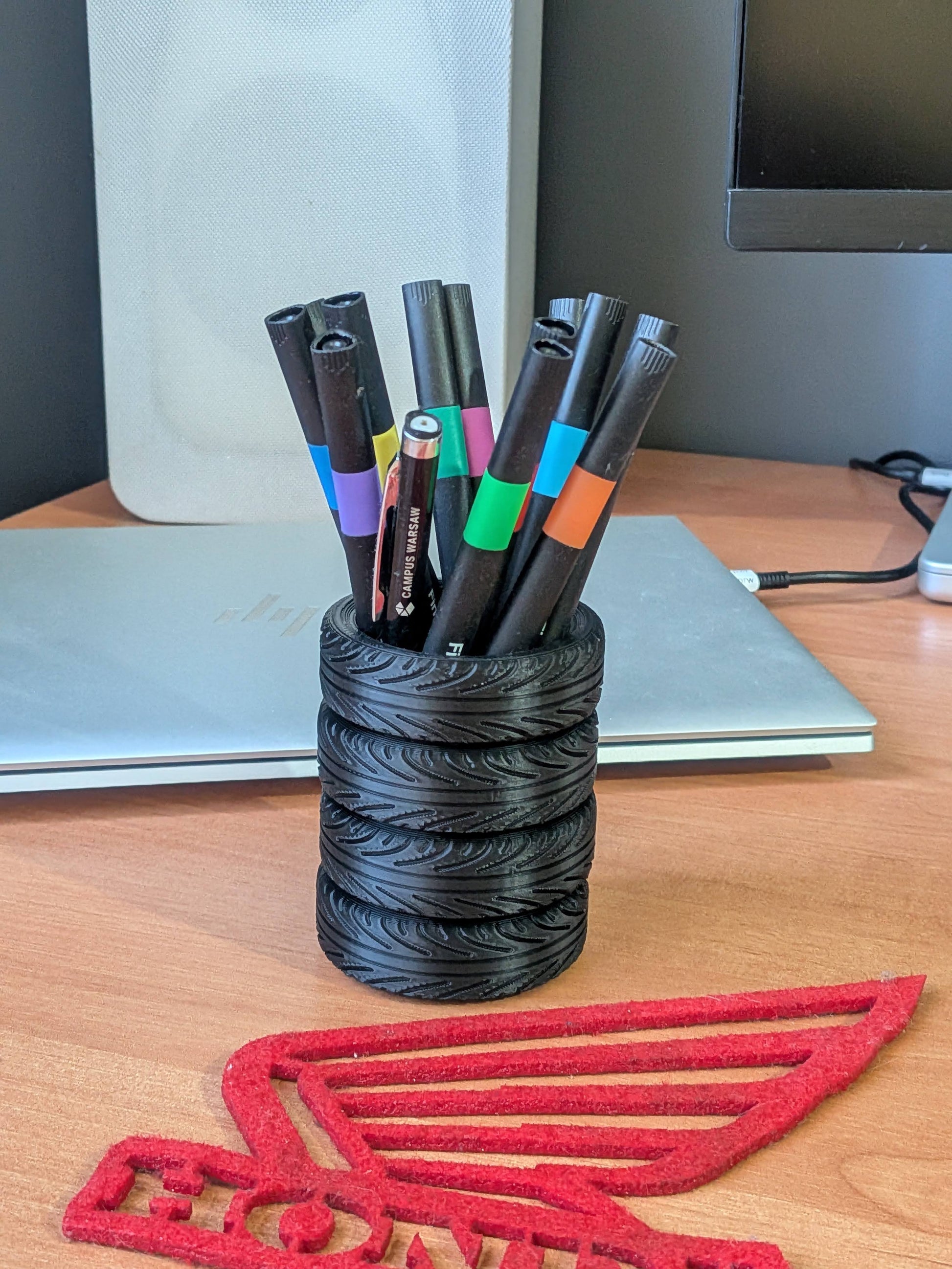 Mud Tire Pen Holder – Offroad Bogger Tire Pen Cup, Flat Bottom Pencil Organizer — Mud tire style for your desk or garage. This offroad bogger tire pen cup keeps pens and pencils in one place while adding a bold wheel-inspired look to any workspace. Loose pens rolling around the bench or cluttering a drawer? A flat-bottom tire pen holder gives you a steady spot that stays put and looks right at home in an office or garage setup. Offroad bogger tire pen holder cup Flat bottom pencil organizer design Compact…